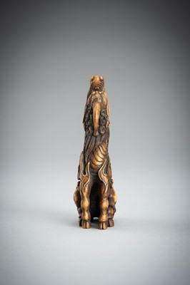 Lot 886 - KOMEI: A WOOD NETSUKE OF A KIRIN
