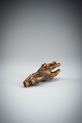 Lot 886 - KOMEI: A WOOD NETSUKE OF A KIRIN