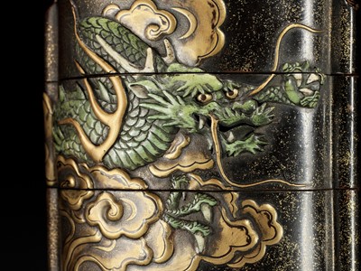 Lot 546 - KAJIKAWA KYUJIRO: AN EXCEPTIONALLY LARGE AND IMPORTANT ANTLER-INLAID LACQUER FOUR CASE INRO DEPICTING A DRAGON, DATED 1647 BY INSCRIPTION