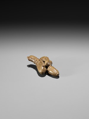 Lot 218 - OUCHI GYOKUSO: A MASTERFUL STAINED AND LACQUERED WOOD NETSUKE OF A GROUP OF CUCUMBERS