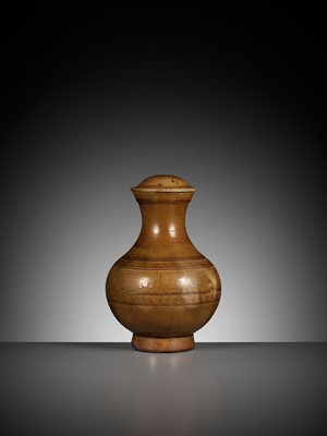 Lot 346 - AN AMBER-GLAZED POTTERY VASE AND COVER, HU, HAN DYNASTY