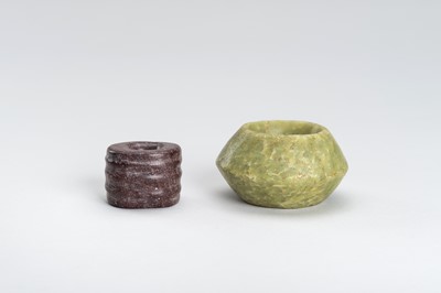 Lot 152 - AN ARCHAISTIC LOT WITH TWO LARGE HARDSTONE BEADS