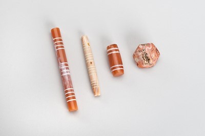 Lot 875 - A GROUP OF FOUR ETCHED PYU CARNELIAN BEADS