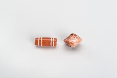 Lot 875 - A GROUP OF FOUR ETCHED PYU CARNELIAN BEADS