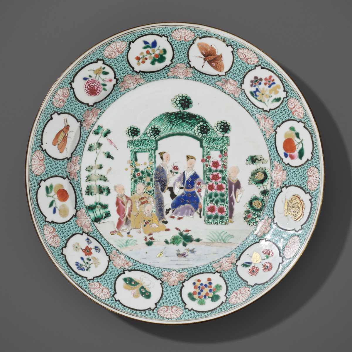 Lot 96 - A FAMILLE ROSE ‘IN THE ARBOR’ DISH BY CORNELIUS PRONK, CHINA, 1735-1740