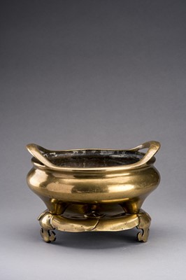 A LARGE GILT-BRONZE TRIPOD CENSER WITH MATCHING STAND, QING