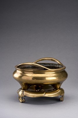 A LARGE GILT-BRONZE TRIPOD CENSER WITH MATCHING STAND, QING