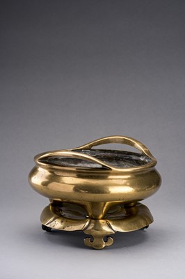 A LARGE GILT-BRONZE TRIPOD CENSER WITH MATCHING STAND, QING