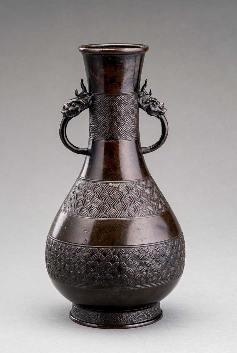 Lot 234 - AN ARCHAISTIC BRONZE ‘DRAGON’ VASE, MING DYNASTY
