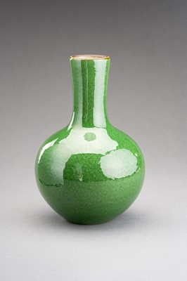 Lot 601 - AN APPLE GREEN CRACKLE-GLAZED BOTTLE VASE, TIANQIUPING, QING DYNASTY