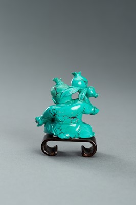 Lot 98 - A TURQUOISE CARVING OF A BOY