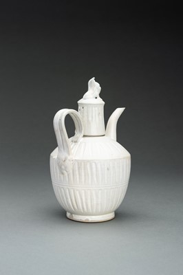 Lot 588 - A DING-TYPE WHITE GLAZED CERAMIC EWER, QING