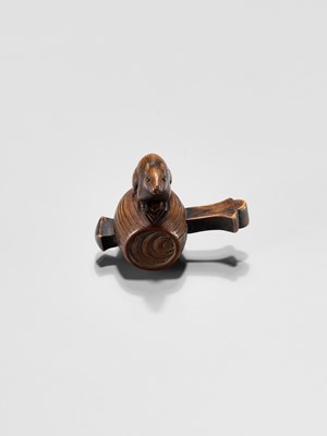 Lot 341 - A WOOD NETSUKE OF A RAT ON DAIKOKU’S WISH-GRANTING MALLET