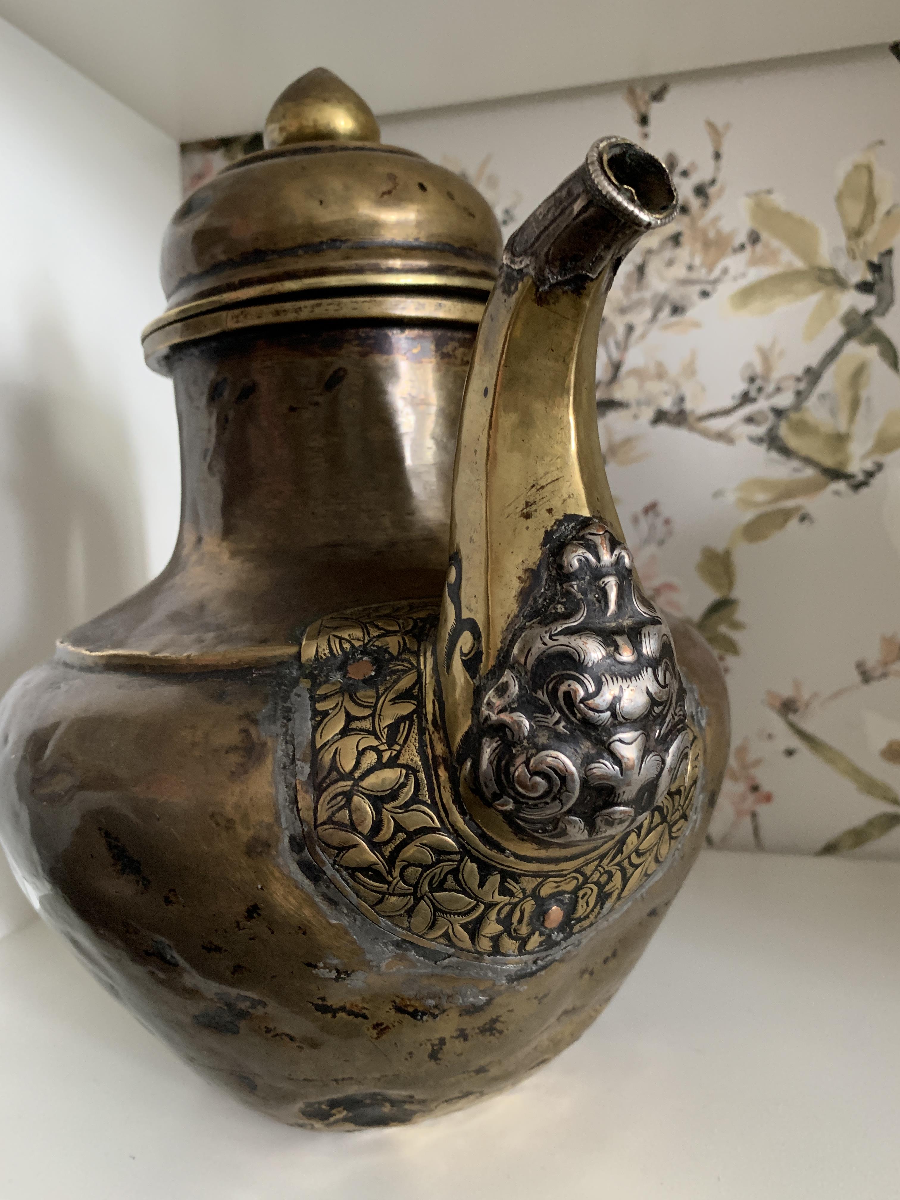 Lot 342 - A TIBETAN COPPER EWER, 19th CENTURY