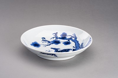 Lot 657 - A BLUE AND WHITE ‘DEER AND CRANE’ PORCELAIN DISH, QING DYNASTY