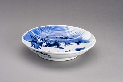 Lot 657 - A BLUE AND WHITE ‘DEER AND CRANE’ PORCELAIN DISH, QING DYNASTY