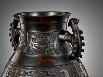 Lot 140 - A LARGE ARCHAISTIC GOLD AND SILVER-INLAID BRONZE VASE, HU, QING DYNASTY
