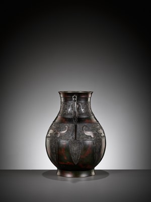 Lot 140 - A LARGE ARCHAISTIC GOLD AND SILVER-INLAID BRONZE VASE, HU, QING DYNASTY