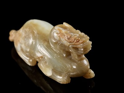 Lot 34 - A RARE, LARGE AND POWERFUL JADE FIGURE OF A BIXIE, MID-WESTERN HAN DYNASTY - EARLY SIX DYNASTIES PERIOD