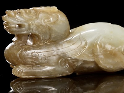 Lot 34 - A RARE, LARGE AND POWERFUL JADE FIGURE OF A BIXIE, MID-WESTERN HAN DYNASTY - EARLY SIX DYNASTIES PERIOD