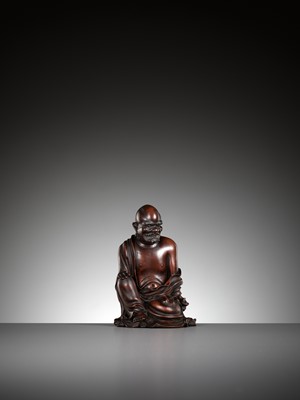 Lot 165 - A HARDWOOD FIGURE OF VIJRAPUTRA, LATE MING DYNASTY TO EARLY QING DYNASTY