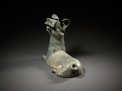 Lot 65 - A LARGE GREEN-GLAZED RED POTTERY FIGURE OF A DOG, HAN DYNASTY