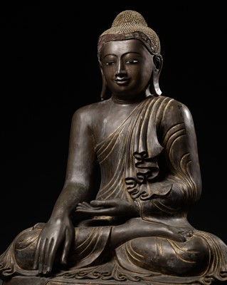 Lot 254 - A MONUMENTAL LACQUER-GILT BRONZE STATUE OF BUDDHA SHAKYAMUNI, MANDALAY PERIOD