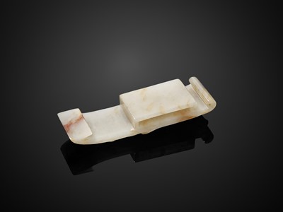 Lot 78 - A 4-PART WHITE AND RUSSET JADE SWORD FITTING, WESTERN HAN