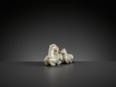 Lot 41 - A PALE GRAY JADE FIGURE OF A DEER WITH YOUNG, 17TH CENTURY