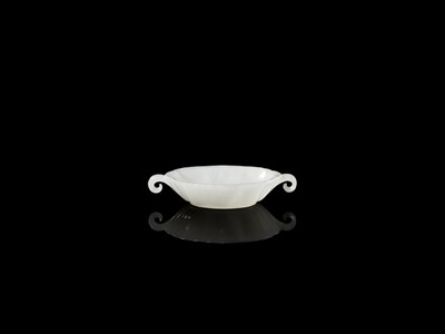 Lot 44 - A WHITE JADE MUGHAL-STYLE LOBED BOWL, 18TH CENTURY