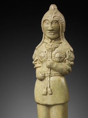 Lot 348 - A STRAW GLAZED POTTERY FIGURE OF A SOLDIER, SUI TO TANG DYNASTY