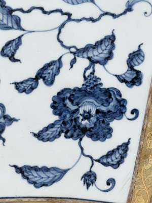 Lot 377 - A PAIR OF ‘POMEGRANATE’ AND ‘CAMELLIA’ PORCELAIN PLAQUES IN PARCEL-GILT SILVER FRAMES, MING DYNASTY