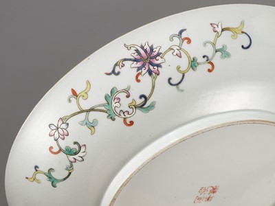 Lot 128 - AN IMPERIAL YELLOW-GROUND BLUE-ENAMELED ‘SHOU’ DISH, TONGZHI MARK AND PERIOD