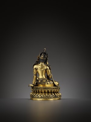 Lot 160 - AN EXTREMELY RARE GILT-BRONZE FIGURE OF AVALOKITESHVARA IN ROYAL EASE, YONGLE INCISED SIX-CHARACTER MARK AND OF THE PERIOD