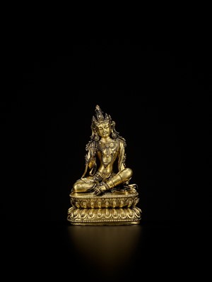 Lot 160 - AN EXTREMELY RARE GILT-BRONZE FIGURE OF AVALOKITESHVARA IN ROYAL EASE, YONGLE INCISED SIX-CHARACTER MARK AND OF THE PERIOD