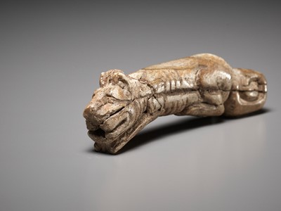Lot 1013 - A RARE CARVED BONE FIGURE OF A TIGER, SHANG DYNASTY