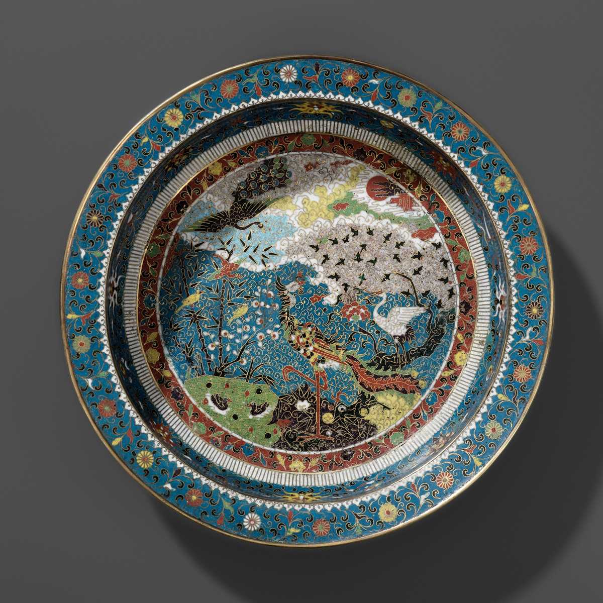 Lot 13 - A LARGE ‘BIRDS WORSHIPPING THE PHOENIX’ CLOISONNÉ BASIN, MING DYNASTY