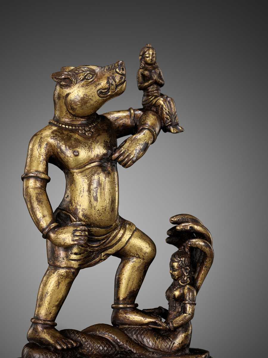 Lot 176 - A RARE GILT BRONZE FIGURE OF VARAHA, NEPAL, 16TH-17TH CENTURY