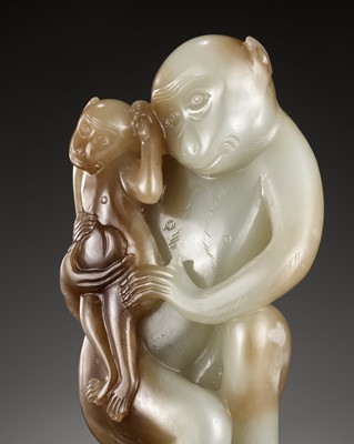 Lot 102 - A FINE PALE CELADON AND CHESTNUT BROWN JADE ‘MONKEYS AND PEACH’ GROUP, 18TH CENTURY