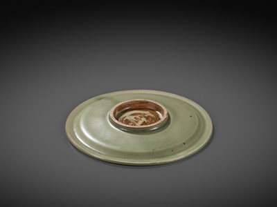 Lot 371 - A YAOZHOU CELADON CARVED DISH, SONG DYNASTY