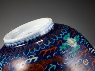 Lot 91 - A RARE BLUE-GROUND POLYCHROME-DECORATED ‘DRAGON’ BOWL, QIANLONG MARK AND PERIOD