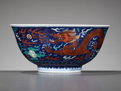 Lot 215 - A RARE BLUE-GROUND POLYCHROME-DECORATED ‘DRAGON’ BOWL, QIANLONG MARK AND PERIOD