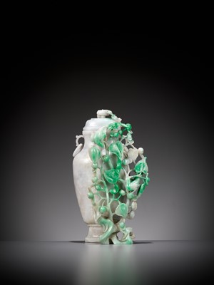 Lot 342 - A LAVENDER AND EMERALD-GREEN JADEITE ‘BIRDS AND FLOWERS’ VASE AND COVER