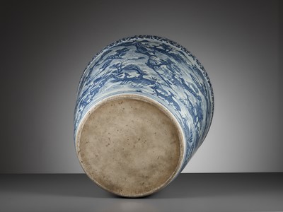 Lot 84 - A LARGE AND VERY HEAVY BLUE AND WHITE ‘HUNDRED DEER’ JARDINIÈRE, MING DYNASTY