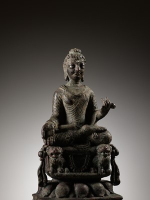 Lot 233 - A BRONZE FIGURE OF BUDDHA SHAKYAMUNI, SWAT VALLEY, 8TH-9TH CENTURY