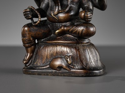 Lot 689 - A SMALL BRONZE FIGURE OF GANESHA, SOUTH INDIA, 17TH - 18TH CENTURY