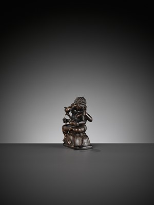 Lot 689 - A SMALL BRONZE FIGURE OF GANESHA, SOUTH INDIA, 17TH - 18TH CENTURY