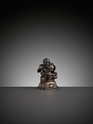 Lot 689 - A SMALL BRONZE FIGURE OF GANESHA, SOUTH INDIA, 17TH - 18TH CENTURY
