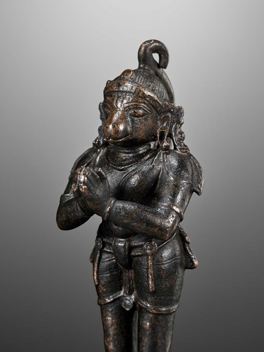 Lot 690 - A BRONZE FIGURE OF HANUMAN, INDIA, 17TH CENTURY