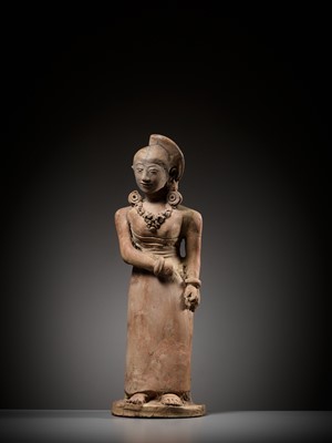 Lot 216 - A MAGNIFICENT AND VERY LARGE TERRACOTTA FIGURE OF A STANDING BEAUTY, MAJAPAHIT PERIOD